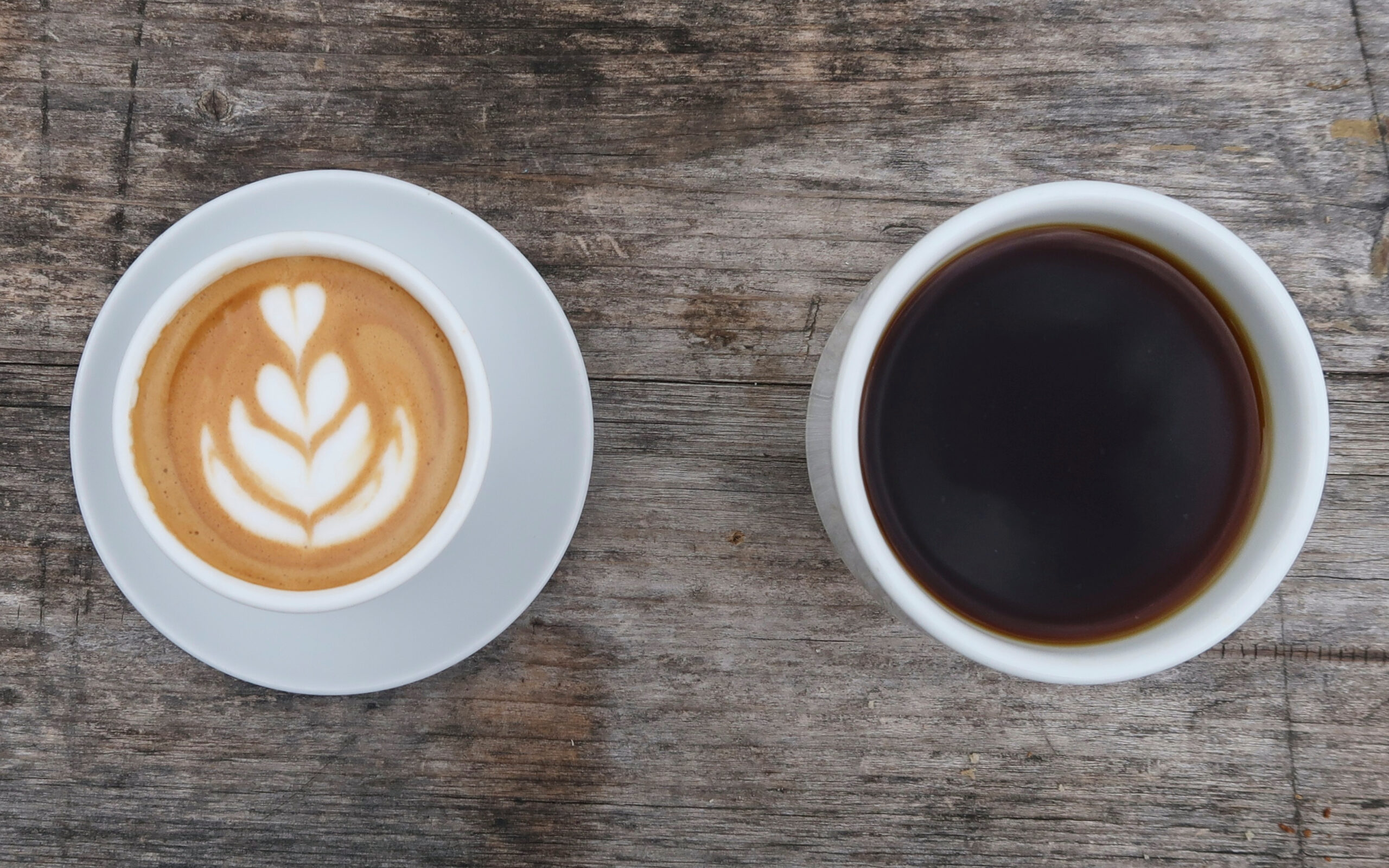 Latte and black coffee on the table